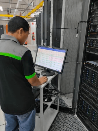 Technician working on server rack