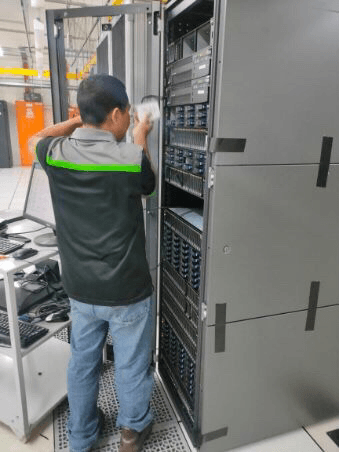 Engineer managing enterprise server equipment